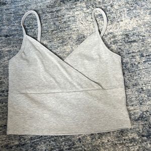 gray cropped tank, criss cross in the front